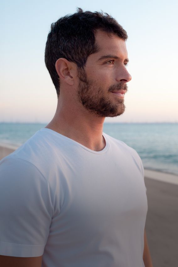 New York City Male Enhancement model on the beach