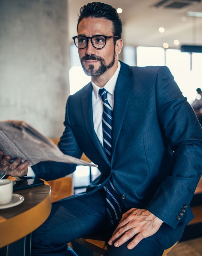 NYC male enhancement model with glasses on