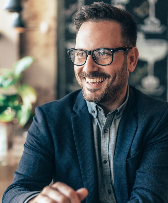 NYC penile enhancement model smiling